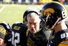iowa favored over rutgers